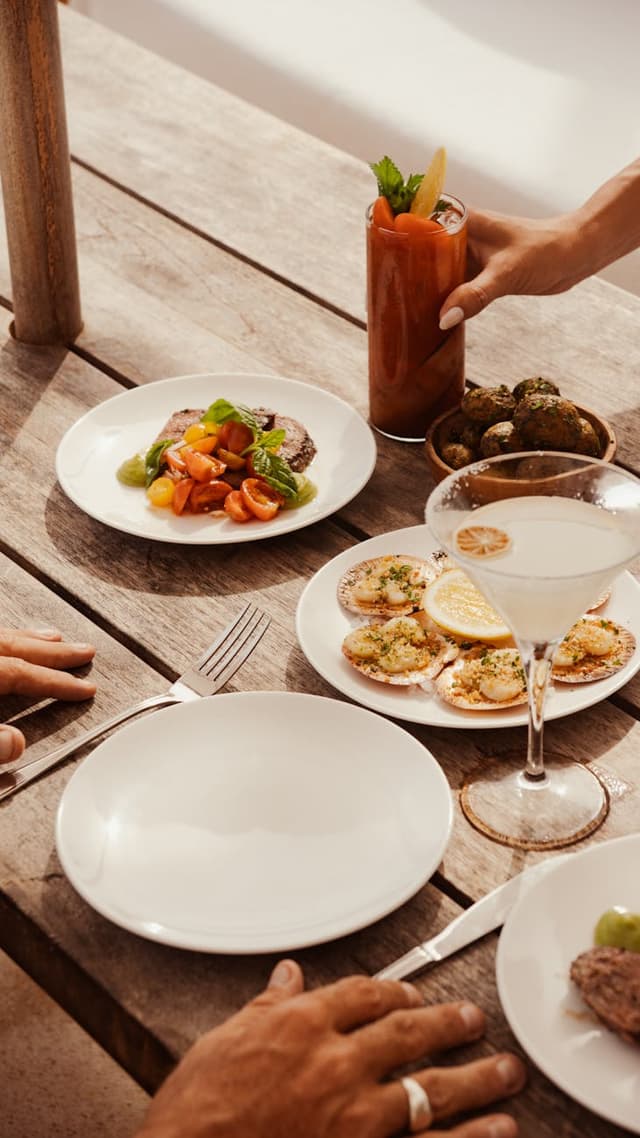 Restaurant table with food and drinks
